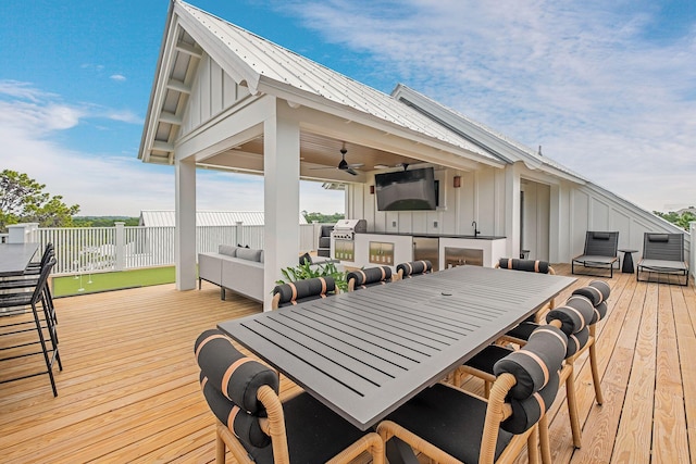 LOT36 Grande Pointe Cir, Inlet Beach, FL 32461 - deck with an outdoor kitchen, a ceiling fan, and outdoor dining space