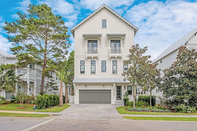 LOT36 Grande Pointe Cir, Inlet Beach, FL 32461 - view of front of property featuring board and batten siding, a balcony, decorative driveway, and an attached garage