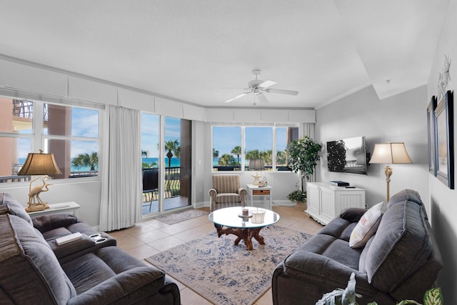 50 Surf Song Ln Unit 312D, Miramar Beach, FL 32550 - living room with light tile patterned floors, ceiling fan, plenty of natural light, and ornamental molding