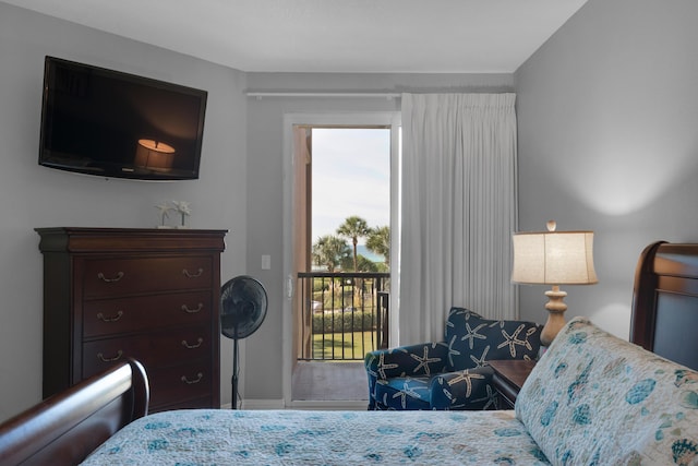 50 Surf Song Ln Unit 312D, Miramar Beach, FL 32550 - bedroom with access to exterior, multiple windows, and baseboards