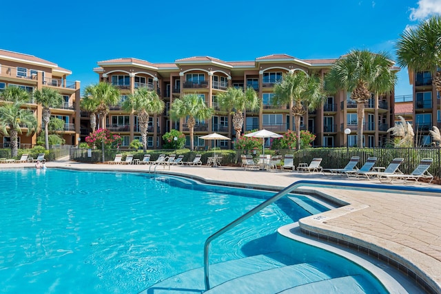 50 Surf Song Ln Unit 312D, Miramar Beach, FL 32550 - community pool featuring a patio