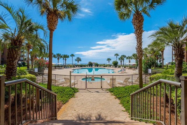 50 Surf Song Ln Unit 312D, Miramar Beach, FL 32550 - community pool with a patio area