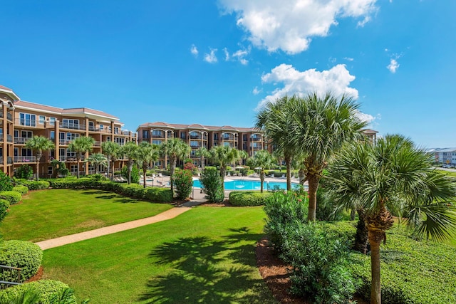 50 Surf Song Ln Unit 312D, Miramar Beach, FL 32550 - view of property's community featuring a yard and a pool