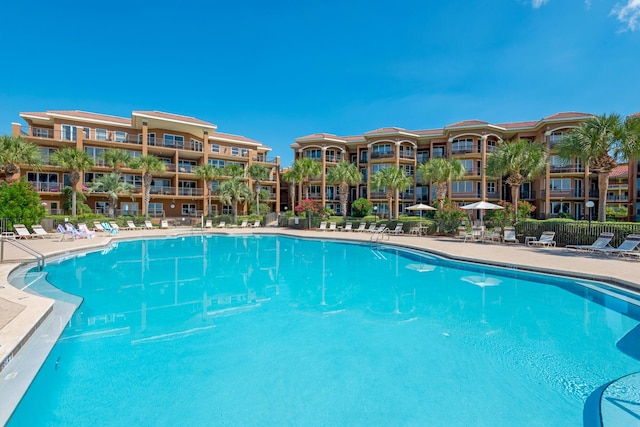 50 Surf Song Ln Unit 312D, Miramar Beach, FL 32550 - community pool featuring a patio area