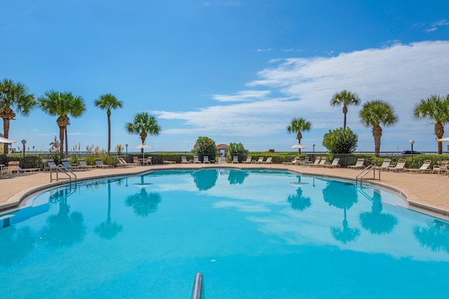 50 Surf Song Ln Unit 312D, Miramar Beach, FL 32550 - community pool featuring a patio