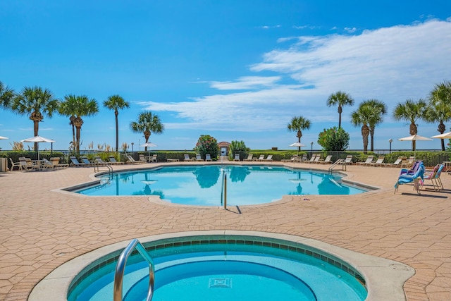 50 Surf Song Ln Unit 312D, Miramar Beach, FL 32550 - community pool featuring a patio area