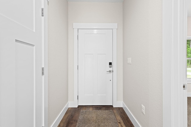 1354 Georgia Ave, Baker, FL 32531 - entryway with dark wood-style flooring and baseboards
