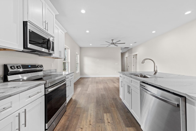 1354 Georgia Ave, Baker, FL 32531 - kitchen with appliances with stainless steel finishes, a sink, dark wood finished floors, ceiling fan, and recessed lighting