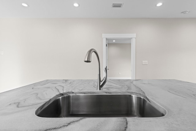 1354 Georgia Ave, Baker, FL 32531 - kitchen view of a sink, recessed lighting, and light stone countertops