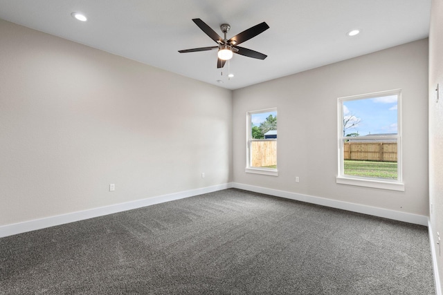 1354 Georgia Ave, Baker, FL 32531 - spare room featuring baseboards, dark carpet, a ceiling fan, and recessed lighting