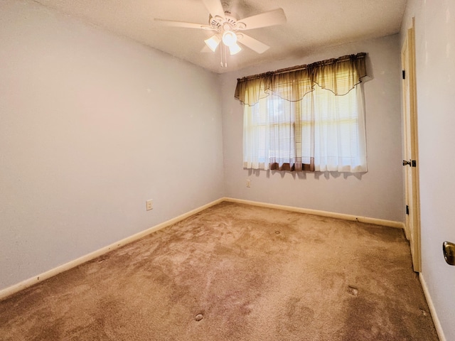22 10th St, Shalimar, FL 32579 - carpeted empty room featuring ceiling fan and baseboards