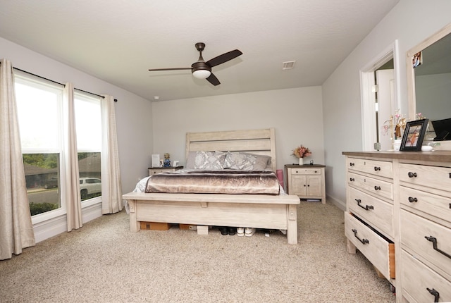 415 Scooter Cv, Crestview, FL 32539 - bedroom featuring light colored carpet and ceiling fan