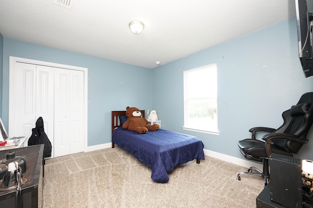415 Scooter Cv, Crestview, FL 32539 - carpeted bedroom with a closet, baseboards, and an office area