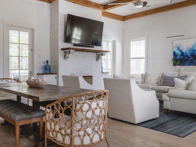 44 Tidepool Ln, Watersound, FL 32461 - living room featuring wood finished floors, plenty of natural light, and beam ceiling