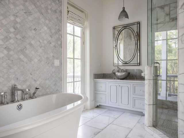 44 Tidepool Ln, Watersound, FL 32461 - full bathroom featuring a freestanding bath, marble finish flooring, and vanity