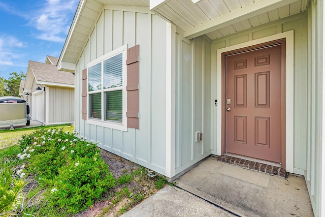205 Laurel Hill St, Crestview, FL 32539 - property entrance featuring board and batten siding and roof with shingles