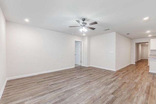 205 Laurel Hill St, Crestview, FL 32539 - spare room featuring light wood finished floors, a ceiling fan, recessed lighting, and baseboards