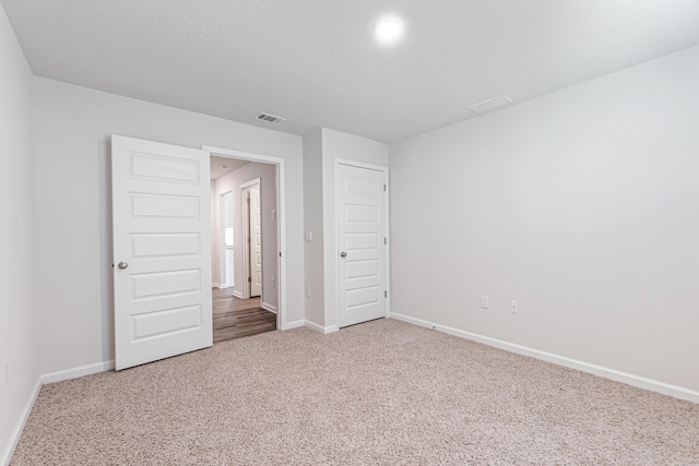 205 Laurel Hill St, Crestview, FL 32539 - unfurnished bedroom with carpet flooring and baseboards