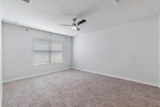 205 Laurel Hill St, Crestview, FL 32539 - carpeted empty room featuring a ceiling fan, a textured ceiling, and baseboards