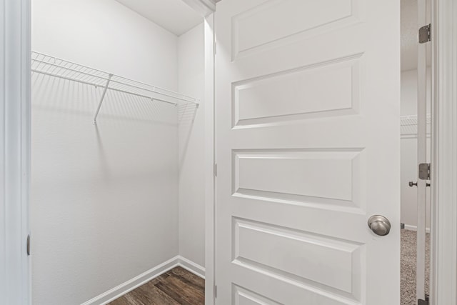 205 Laurel Hill St, Crestview, FL 32539 - spacious closet with dark wood-type flooring