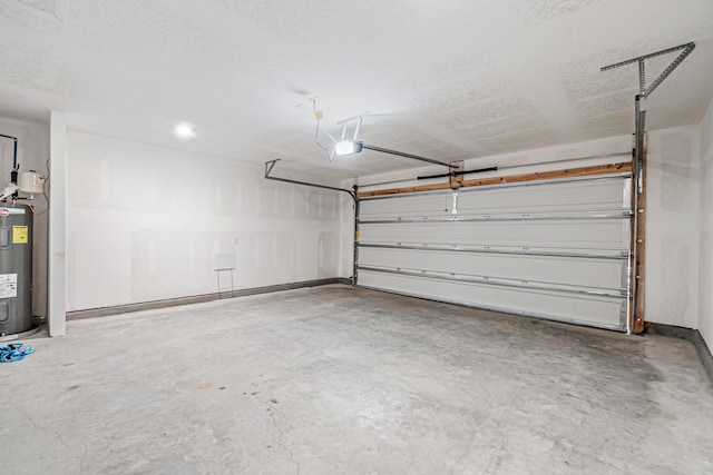205 Laurel Hill St, Crestview, FL 32539 - garage featuring a garage door opener and water heater