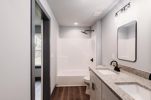 4618 Eagle Way, Crestview, FL 32539 - full bathroom with wood finished floors, double vanity, bathing tub / shower combination, and recessed lighting