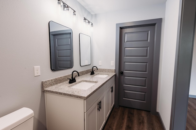 4618 Eagle Way, Crestview, FL 32539 - bathroom featuring wood finished floors and double vanity