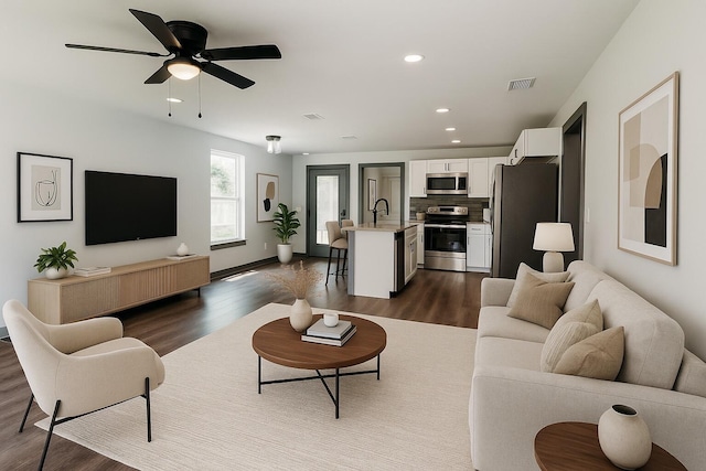 4618 Eagle Way, Crestview, FL 32539 - living room featuring dark wood finished floors, ceiling fan, and recessed lighting