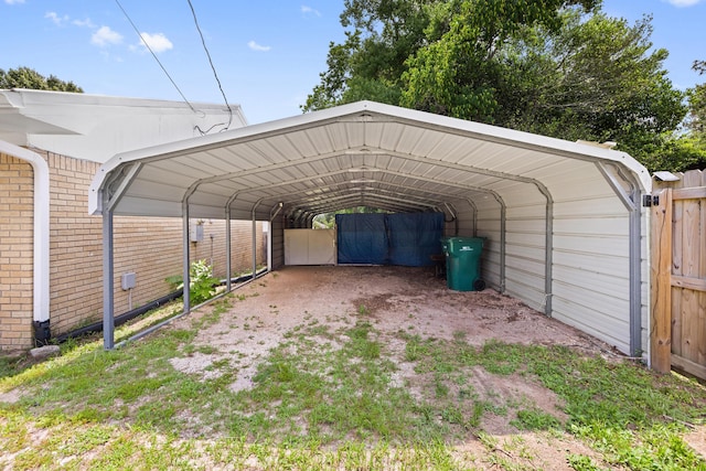 306 Forrest Pkwy, Crestview, FL 32539 - view of parking with a detached carport