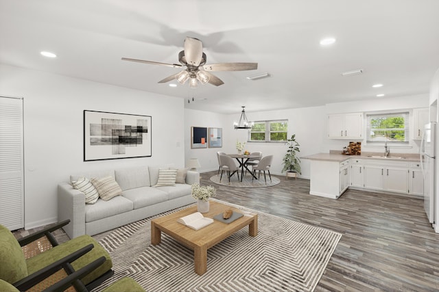 306 Forrest Pkwy, Crestview, FL 32539 - living room with wood finished floors, ceiling fan, recessed lighting, a chandelier, and healthy amount of natural light