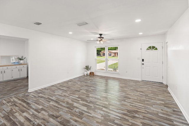 306 Forrest Pkwy, Crestview, FL 32539 - unfurnished living room featuring a ceiling fan, wood finished floors, recessed lighting, and baseboards