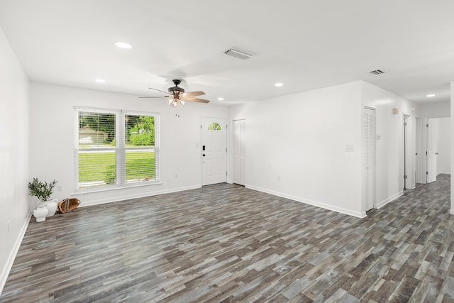 306 Forrest Pkwy, Crestview, FL 32539 - unfurnished living room with wood finished floors, baseboards, a ceiling fan, and recessed lighting