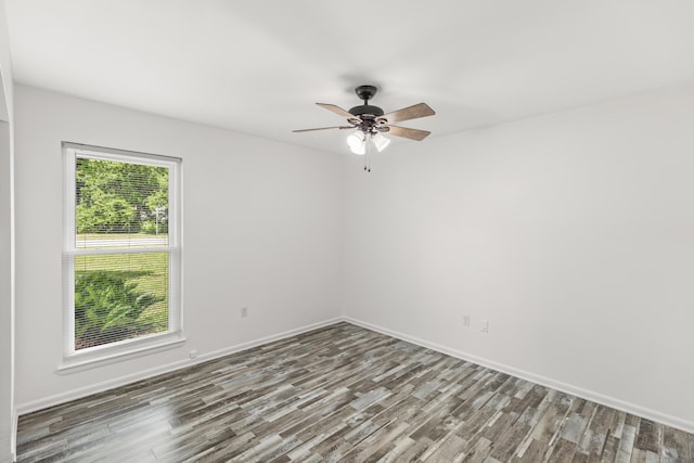 306 Forrest Pkwy, Crestview, FL 32539 - empty room featuring wood finished floors, a ceiling fan, and baseboards
