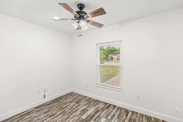 306 Forrest Pkwy, Crestview, FL 32539 - empty room featuring wood finished floors, baseboards, and a ceiling fan