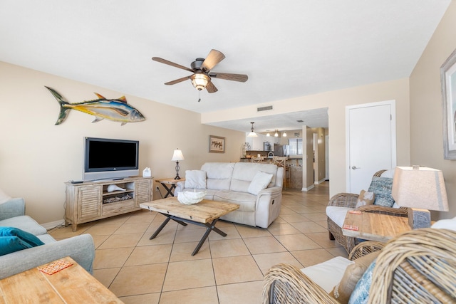 21514 Front Beach Rd, Panama City Beach, FL 32413 - living area featuring light tile patterned floors and ceiling fan