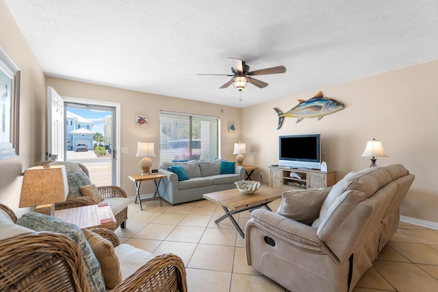 21514 Front Beach Rd, Panama City Beach, FL 32413 - living area with light tile patterned floors, ceiling fan, and a textured ceiling