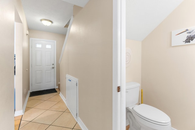21514 Front Beach Rd, Panama City Beach, FL 32413 - entryway with light tile patterned floors and baseboards