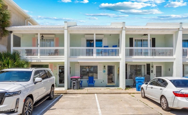 21514 Front Beach Rd, Panama City Beach, FL 32413 - view of property featuring uncovered parking