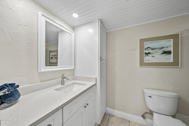 17155 Front Beach Rd Unit W405, Panama City Beach, FL 32413 - bathroom featuring vanity, toilet, tile patterned flooring, and baseboards