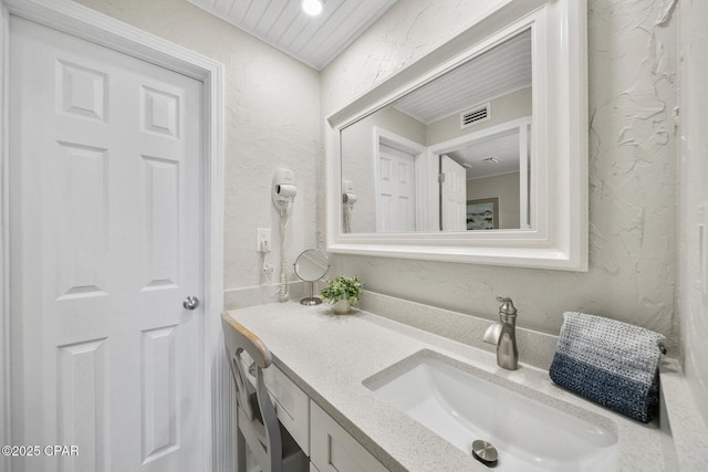 17155 Front Beach Rd Unit W405, Panama City Beach, FL 32413 - bathroom with vanity and a textured wall
