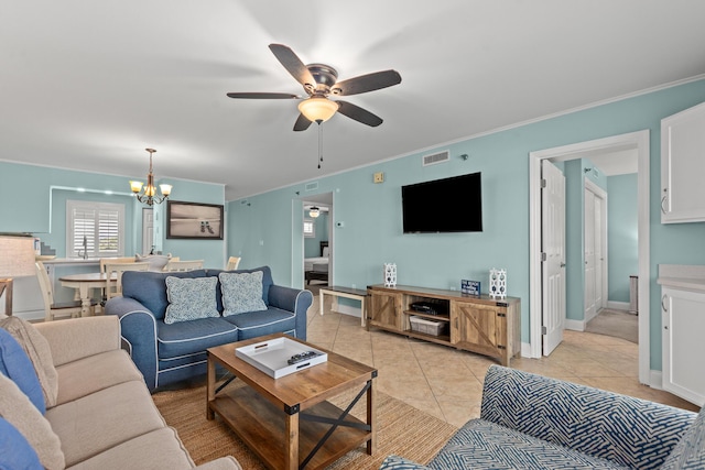 502 Gulf Shore Dr Unit 215, Destin, FL 32541 - living room with ceiling fan, a chandelier, light tile patterned floors, crown molding, and baseboards