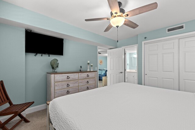 502 Gulf Shore Dr Unit 215, Destin, FL 32541 - bedroom featuring a closet, carpet, baseboards, and a ceiling fan