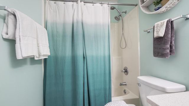 17642 Front Beach Rd Unit G4, Panama City Beach, FL 32413 - bathroom featuring toilet, shower / tub combo with curtain, and vanity