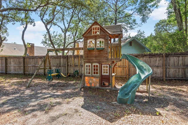 207 Oakwood Cir, Niceville, FL 32578 - view of play area featuring a fenced backyard