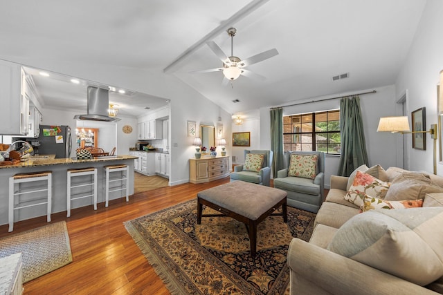 207 Oakwood Cir, Niceville, FL 32578 - living room featuring a ceiling fan and light wood finished floors