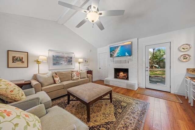 207 Oakwood Cir, Niceville, FL 32578 - living area with a fireplace, wood-type flooring, a ceiling fan, and baseboards