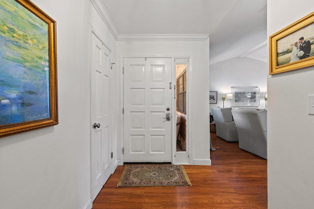 207 Oakwood Cir, Niceville, FL 32578 - foyer entrance with wood finished floors, vaulted ceiling, and ornamental molding