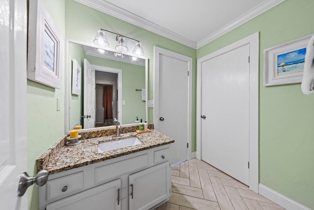 207 Oakwood Cir, Niceville, FL 32578 - bathroom featuring vanity, crown molding, and baseboards