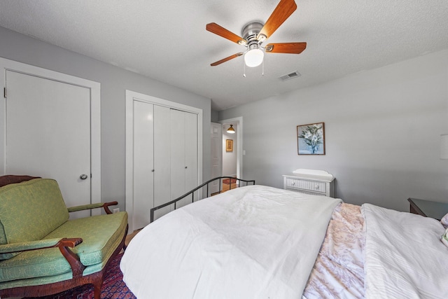 207 Oakwood Cir, Niceville, FL 32578 - bedroom featuring a closet and a ceiling fan