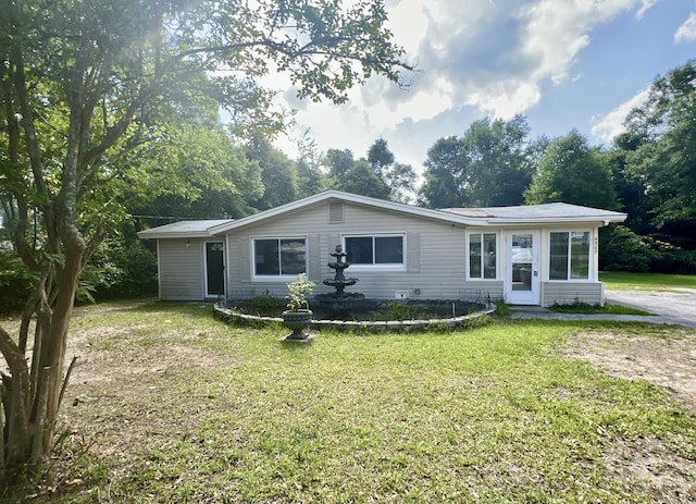 4307 7th Ave, Pace, FL 32571 - view of front of property with a front lawn